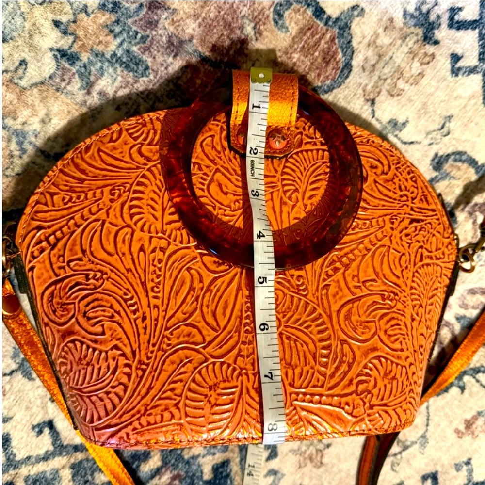 Patricia Nash dome, orange bronze color. EUC crossbody